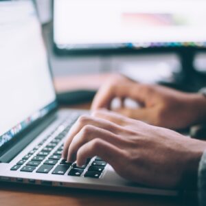 Vulnerability assessment tool scanning a network for cybersecurity threats with visual elements of data protection, system security, and risk analysis.
